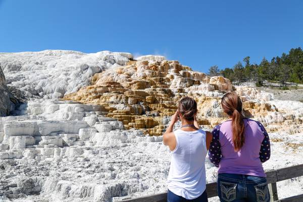 Two Yellowstone visitors at Mammoth Hot Springs